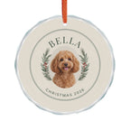 Ivory Evergreen ornament with curved Bella and Christmas 2026 lettering and example dog portrait — Printify-rendered mockup.